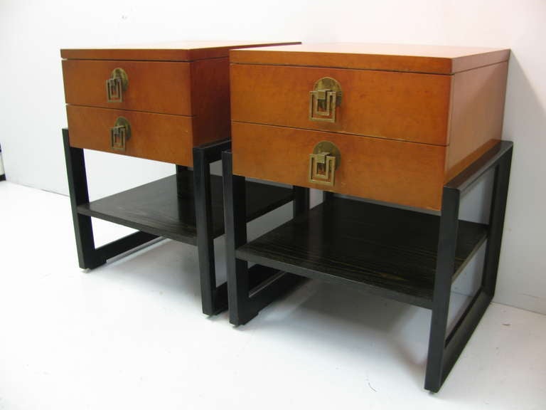 Amazing pair of night tables By Renzo Rutili. Beautiful form with a simple Classic Asian influence. Two drawers supported by ebonized oak frame. Renzo Rutili was lead designer at Johnson for thirty years and oversaw projects by noted Mid-Century