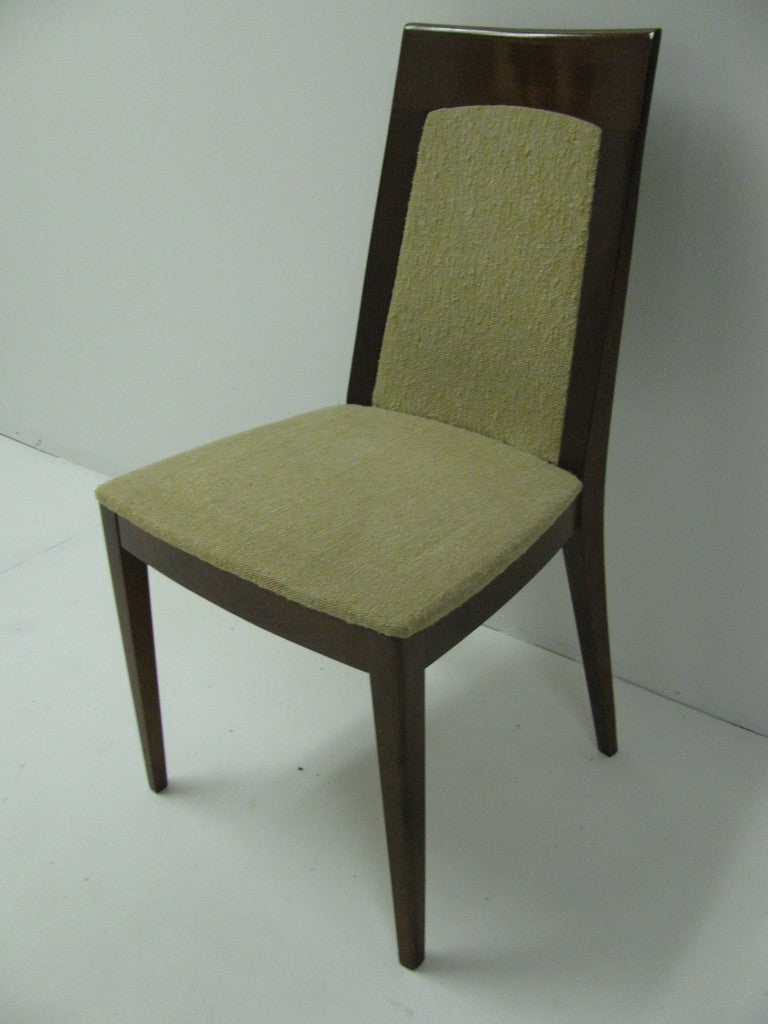 Slender, sleek mahogany high back dining chairs in a minimalist style. Chairs are from Germany and signed but cannot decipher markings. Upholstery service available.

 Please call in advance for an appointment or if you have any questions 
