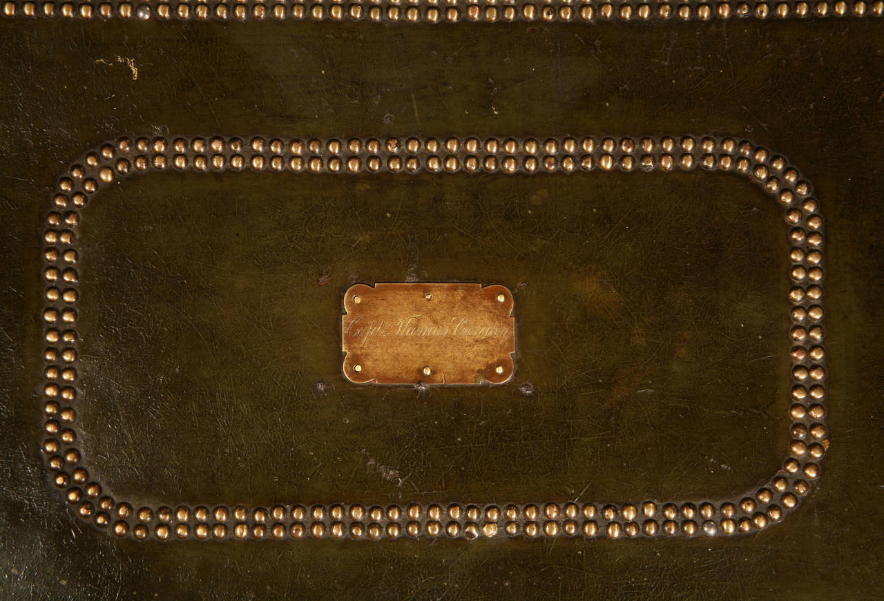 This green leather on camphor wood China Trade trunk has an engraved name plate for Capt. Thomas Canney. Little is known of the captain but it is very likely that it is the same Thomas Canney who transported convicts to Australia on The Katherine
