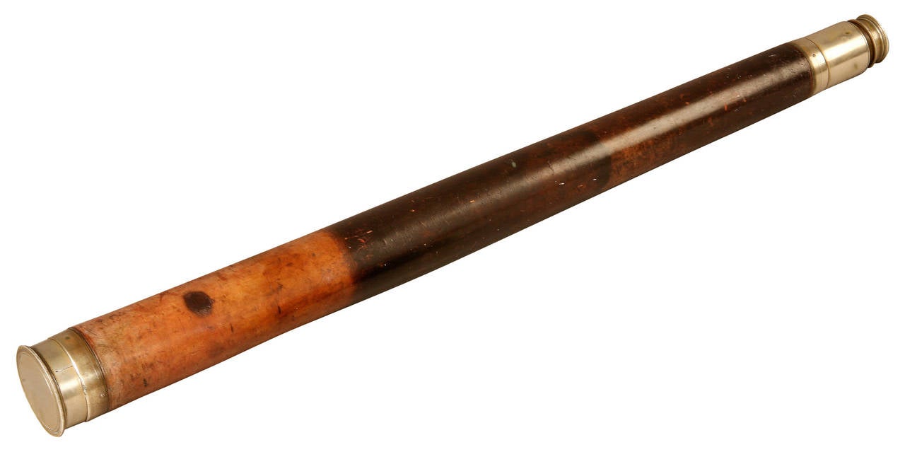 A silvered brass single draw Telescope by Cox with leather grip to the barrel. The telescope has a dust slide to the eye piece and a cap. The tube is engraved Cox, Devonport, Optician to the R.W.Y.C. Cox established his business in Devonport,