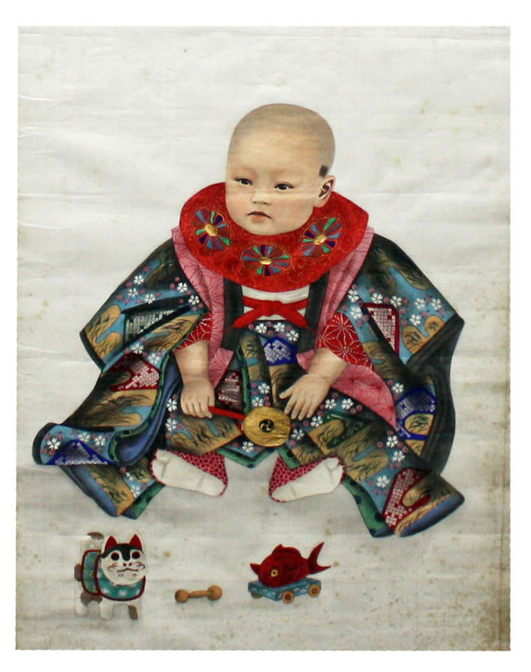 A set of four Japanese paintings on silk showing three ladies and a young child playing with his toys.