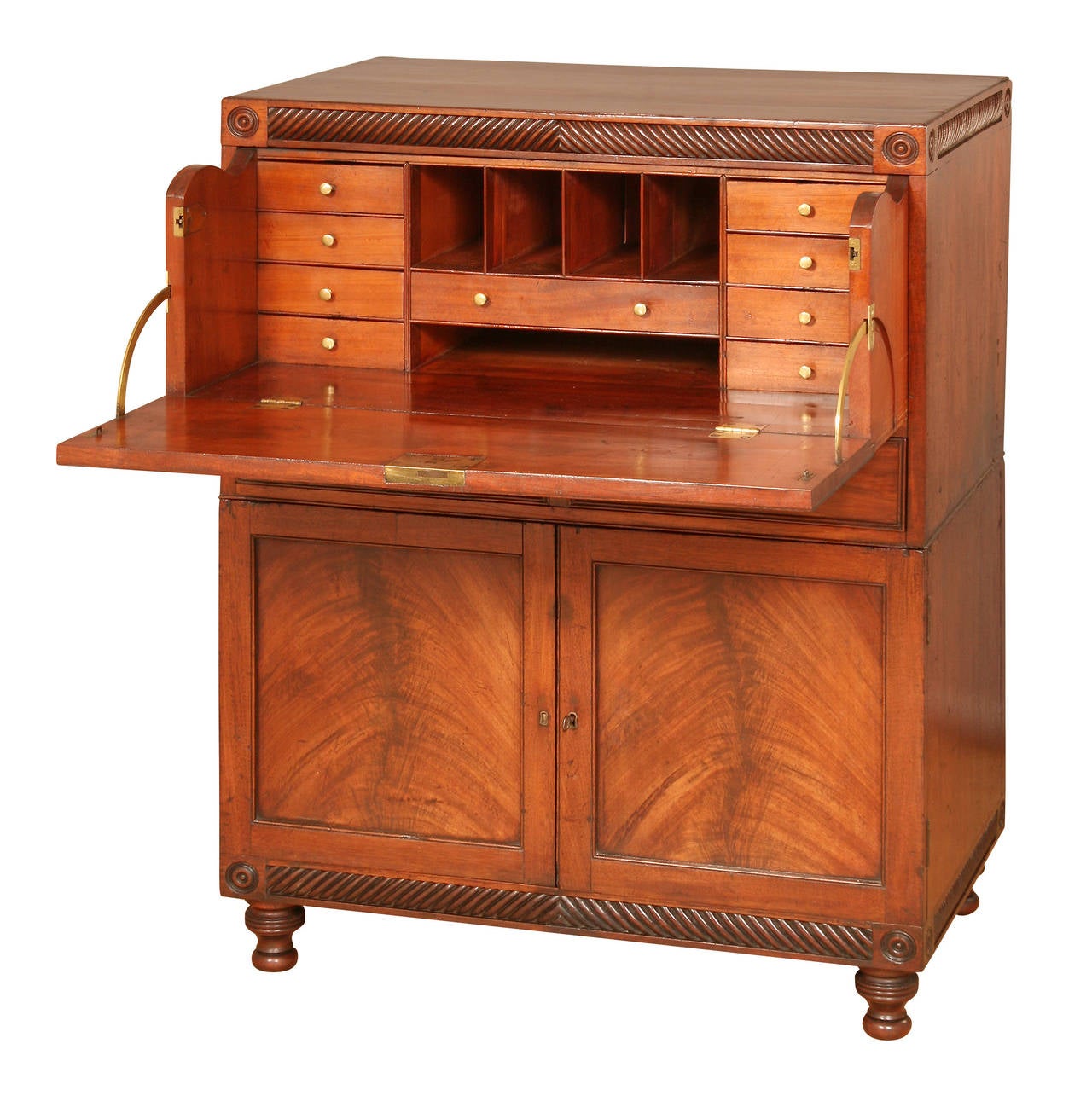 This Georgian mahogany Campaign Chest is earlier than most on the market. Although the chest has turned roundels to the corners and a wide decorative moulding to the top and bottom it has no overhanging timber that might suffer during travel. The