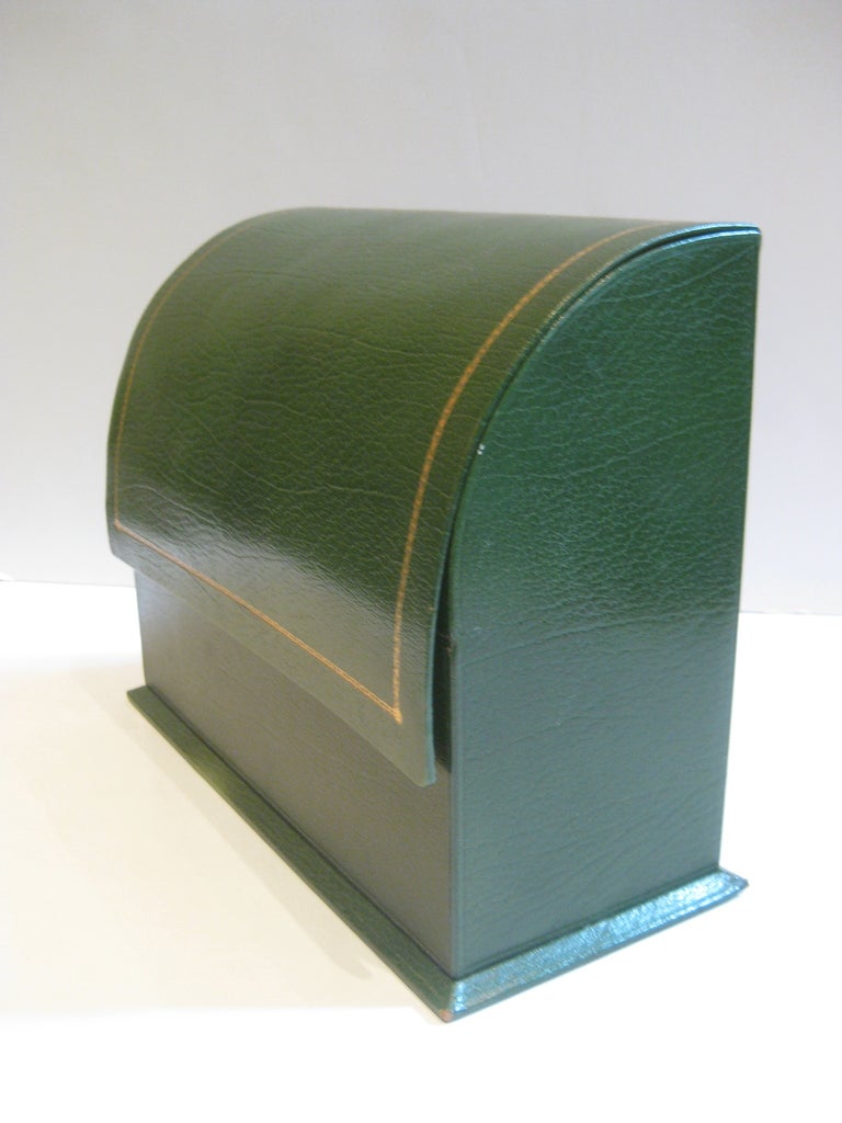 A vintage Smythson of Bond Street green leather desk set that includes a stationery box, pen holder, and box for note cards. A rich deep green leather with gilt edges. Smythson stamp on the bottom of each piece.

Letter box dimensions: 11.75