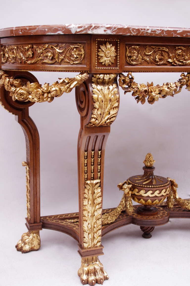 . Louis XVI style
. Red marble top
. Gilded wood highlights
. 19th century