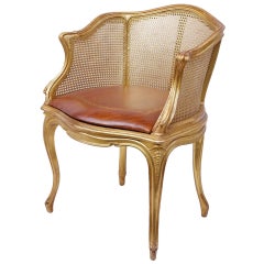 Elegant Louis XV Style Gilt and Caned Armchair