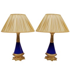 Pair of conical blue porcelain lamps and gilt bronze mount, 1900 period