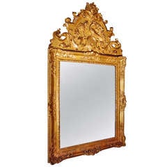 19th c. Regency style mirror in sculpted and gilded wood