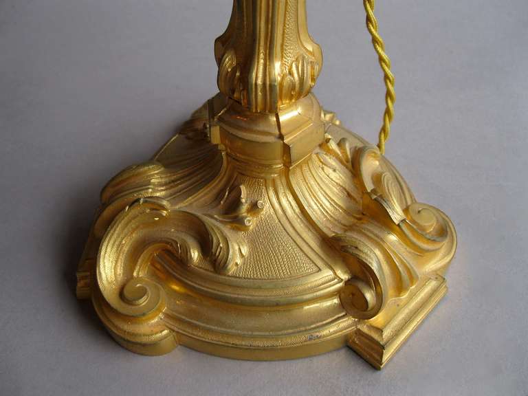 Rococo Pair of gilt bronze Rocaille style candlesticks, circa 1940 For Sale