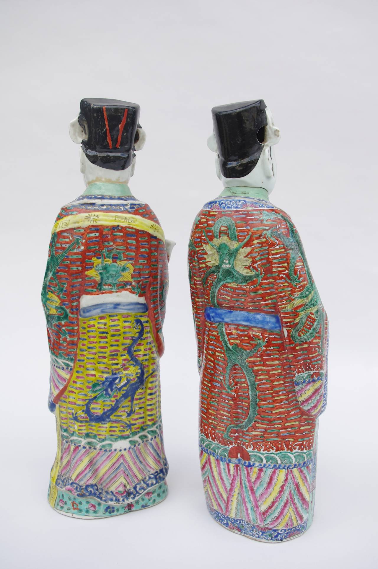 Asian Pair of Chinese dignitaries in polychrome faience, 1900 period