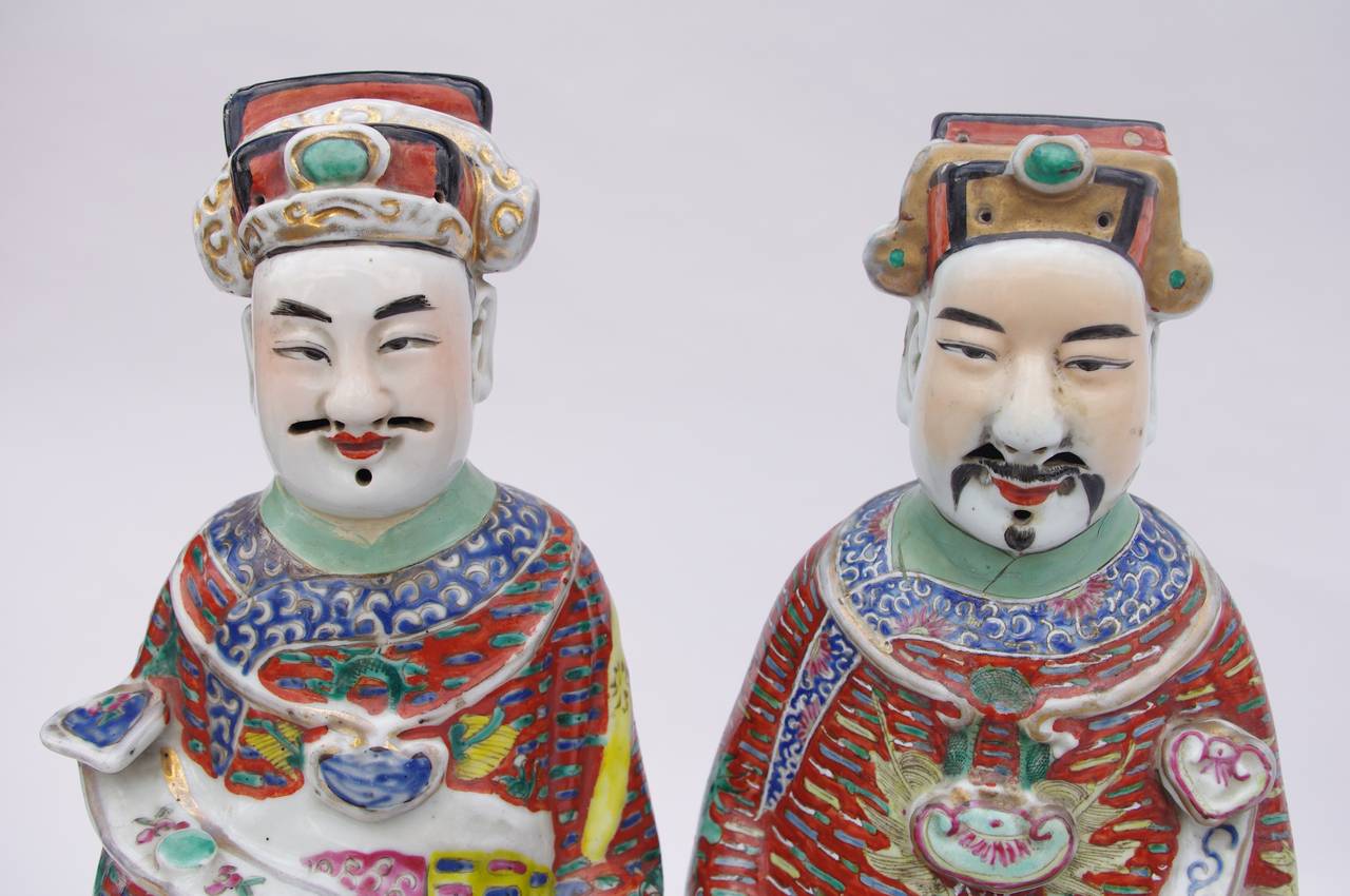 Chinese Export Pair of Chinese dignitaries in polychrome faience, 1900 period