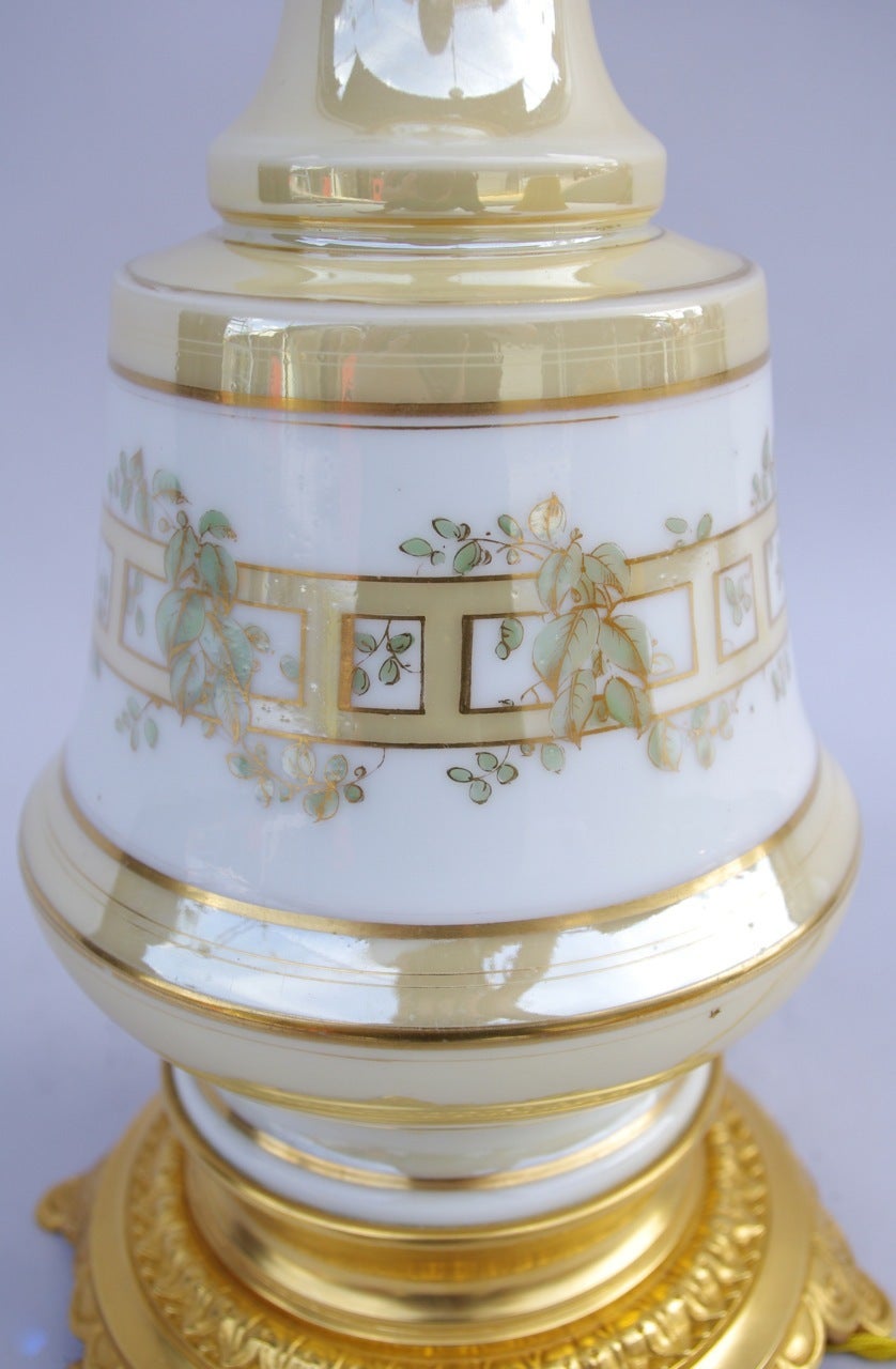 French Pair of Iridescent White and Cream Paris Porcelain Lamps, Mounted in Gilt Bronze