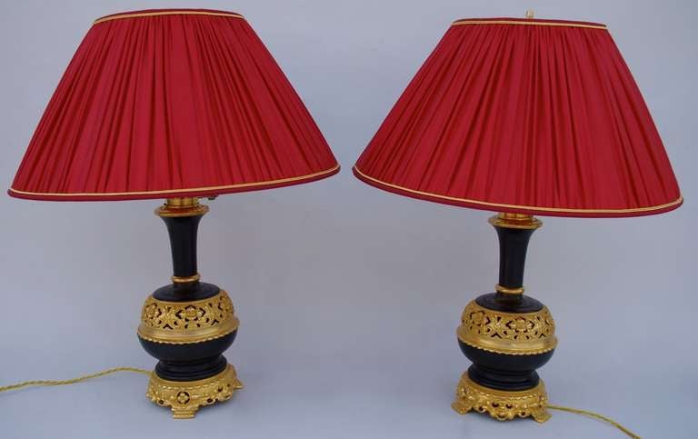 19th c. Pair of two patinas bronze open work lamps