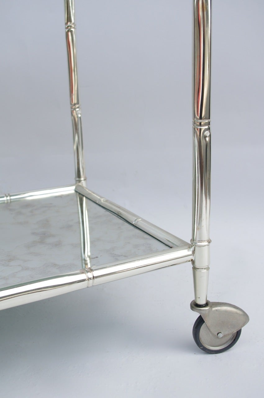 French Pair of rolling silvered metal trolleys, circa 1970