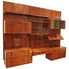 Customizable wall bookcase by Poul CADOVIUS for Roche Bobois from1960