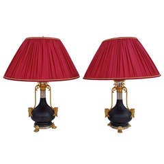 19th c. Pair of lamps with two patinas