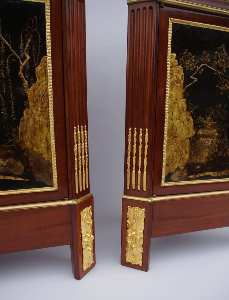 1900. Pair of lacquered Louis XVI style corner cupboards in mahogany 1