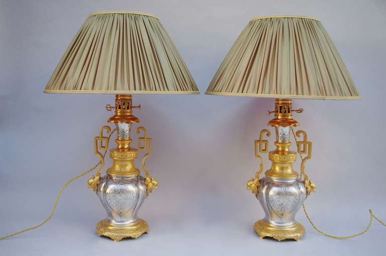 19th c. Pair of gilded ans silvered bronze