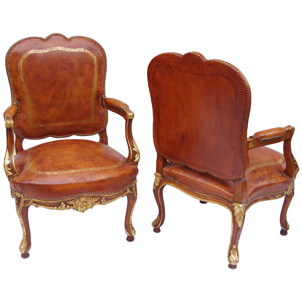 Pair of Louis XV style brown leather armchairs circa 1950