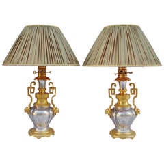 19th c. Pair of gilded ans silvered bronze