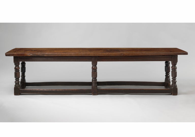 With a Handsome Six Legged Joined
Frame Base Retaining the Original
Stretchers
Richly Patinated Oak with Original
Surface and Excellent Nutty Colour
English, c1620
32½” high x 134¼” wide x 31½” deep
Provenance: Private Collection, Wiltshire.
