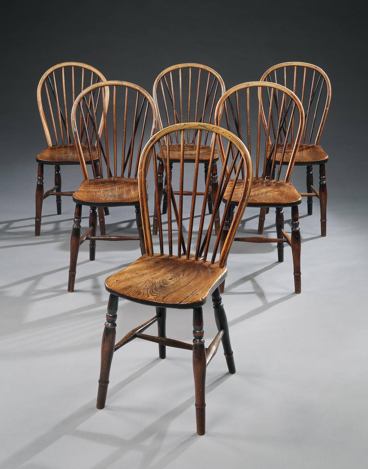 Of Classic bentwood and turned spindle form with saddled seats.
Nutty colored ash and elm.
English, Buckinghamshire, circa 1820.
Measures: 34.75” high x 17” wide x 14.5” deep.
Seat height: 16.5