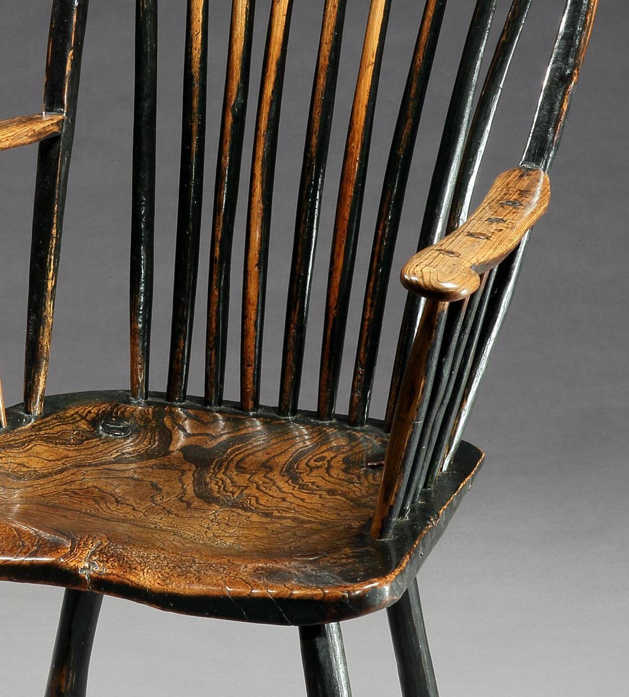 With well saddled seat and graphic movement to the spindles
Ash and elm with traces of original painted surface.