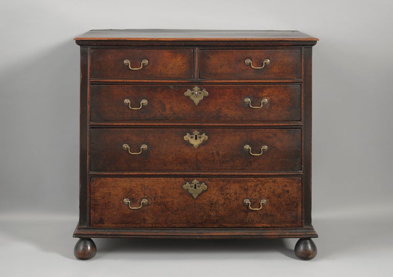 Various Indigenous Timbers Including Elm, Walnut, and Fruitwood
With Exceptional Rich Nutty Colour and Great Original Surface
English, c1740

Of delightful small scale and elegant proportions, with four tiers of graduated drawers, this