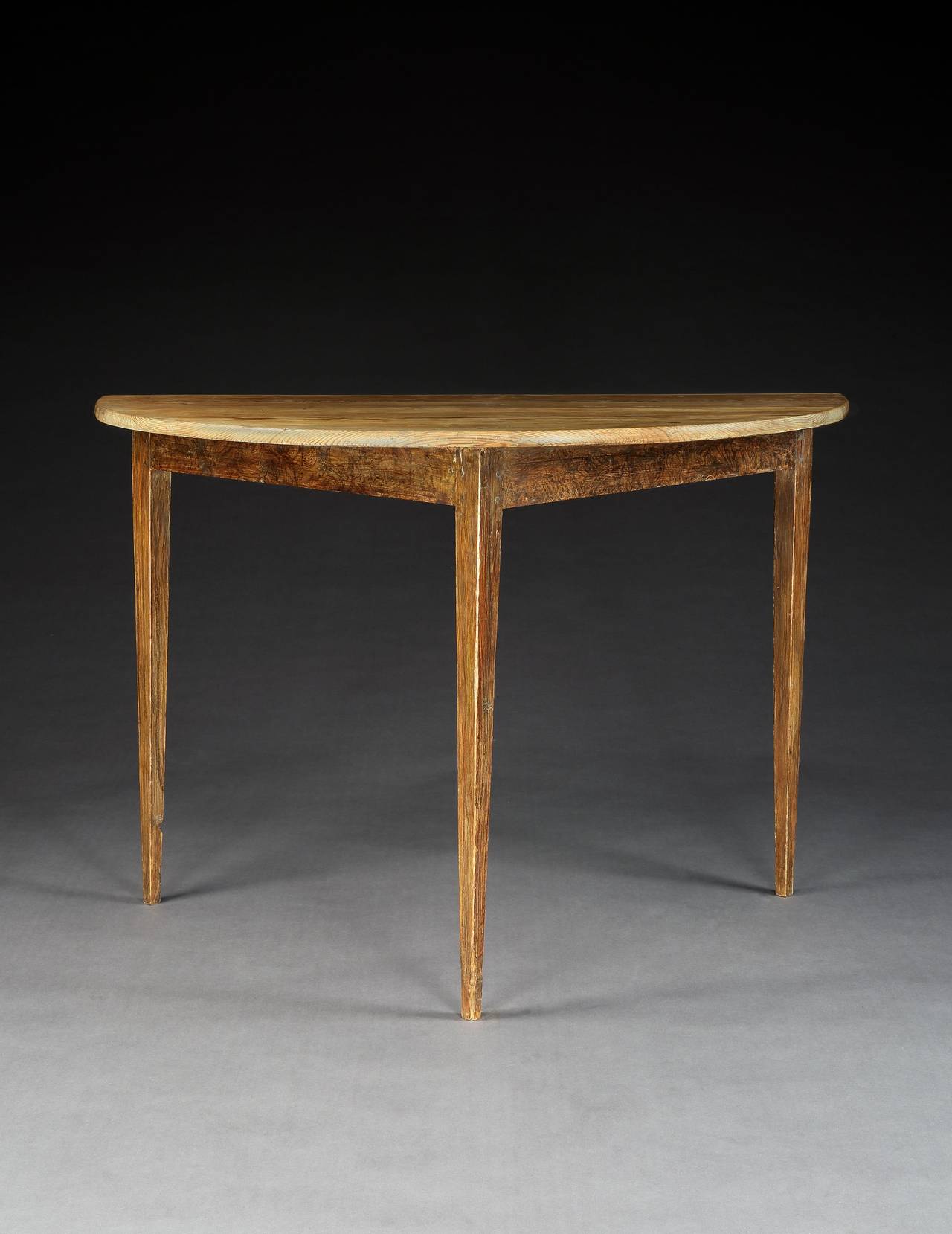 Demilune console of particularly refined elegant form
pine with original Primitive faux grain decoration.