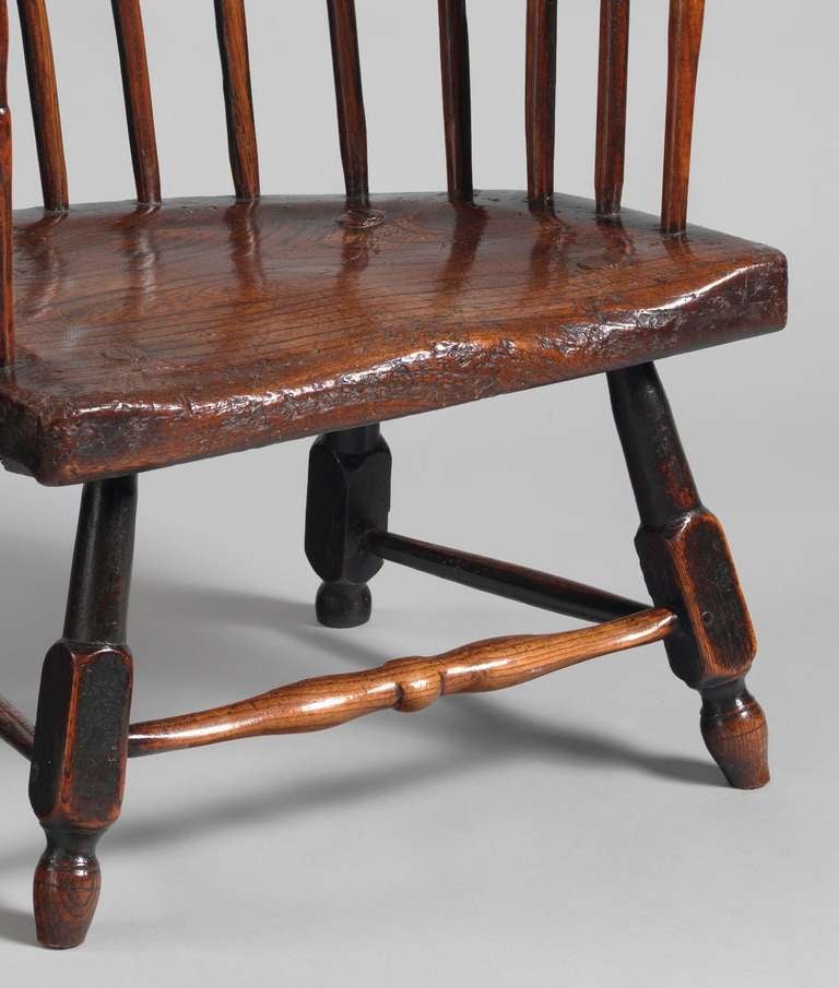 With Winged Arched Comb, Horseshoe Arm Bow and Unusual Turned Legs Richly Patinated and Burnished Ash and Oak
English or Welsh, c1760