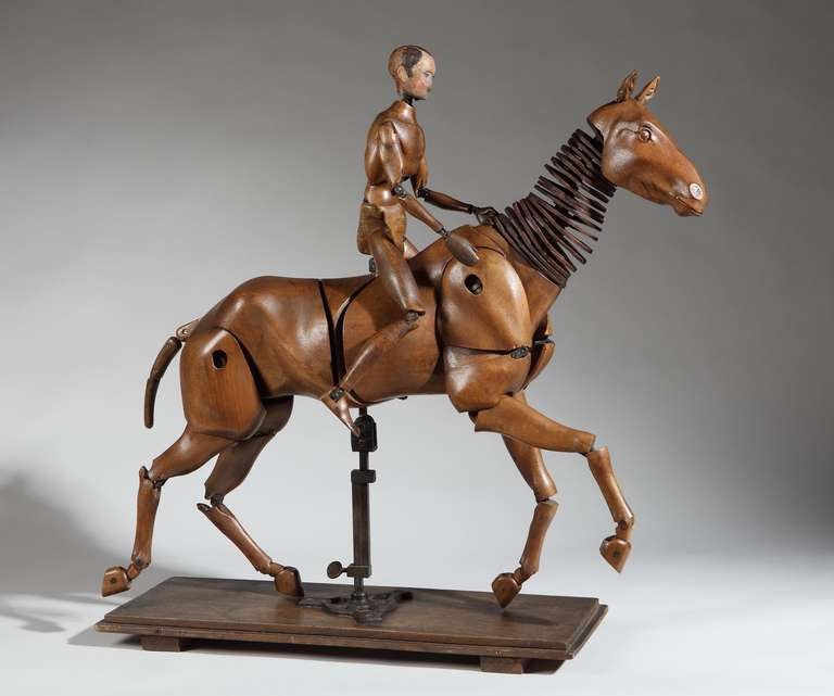 Hand Carved Wood, Leather and Metal Joints 
With Original Impressed Stamp to Both Figures 
French, c.1890 

Artists’ “Lay Figures” or Mannequins were made to act as proportional and movement models for artists when creating compositions. Human