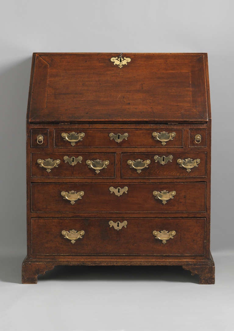 With Well Fitted Interior
Pine with Original Painted Surface
English, c.1760
33” wide x 41” high x 17½” deep

A most unusual Georgian fall front writing desk with comprehensively fitted interior and retaining its original paint decorated