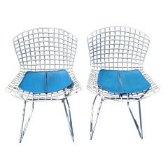 Pair of Welded Mesh White Chairs designed  by Harry Bertoia