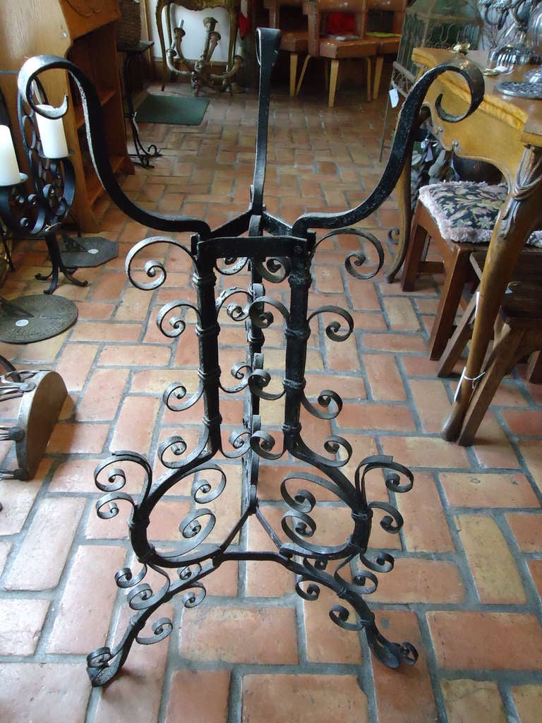 Hand-forged iron plant stand in the manner of Samuel Yellin. Comes with a solid copper bowl for a planter stamped, France.