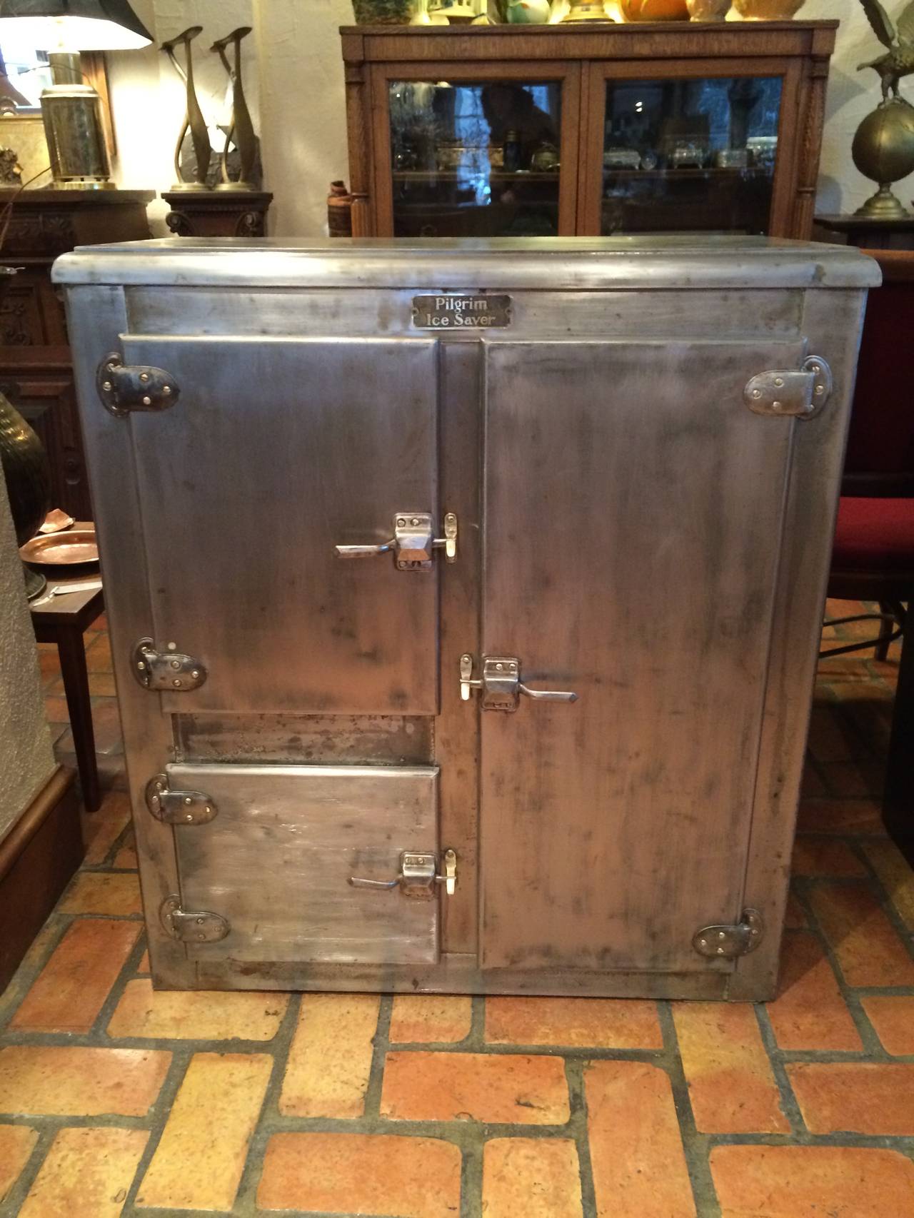 Antique Stainless Steel Industrial Ice Box/Bar by Pilgrim. Great piece for kitchen or man cave. Industrial or country home. Perfect for storing liquor, wine and bar ware. Rare and unique this is quite a conversation piece.