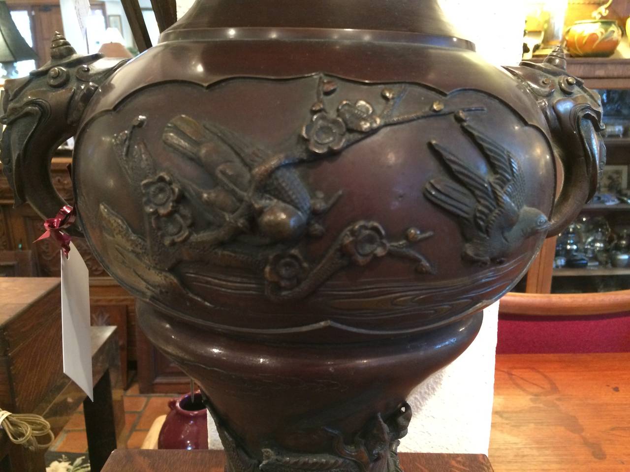 Large Meiji Period Bronze Twin Handled Urn with Decoration In Good Condition For Sale In Redding, CT