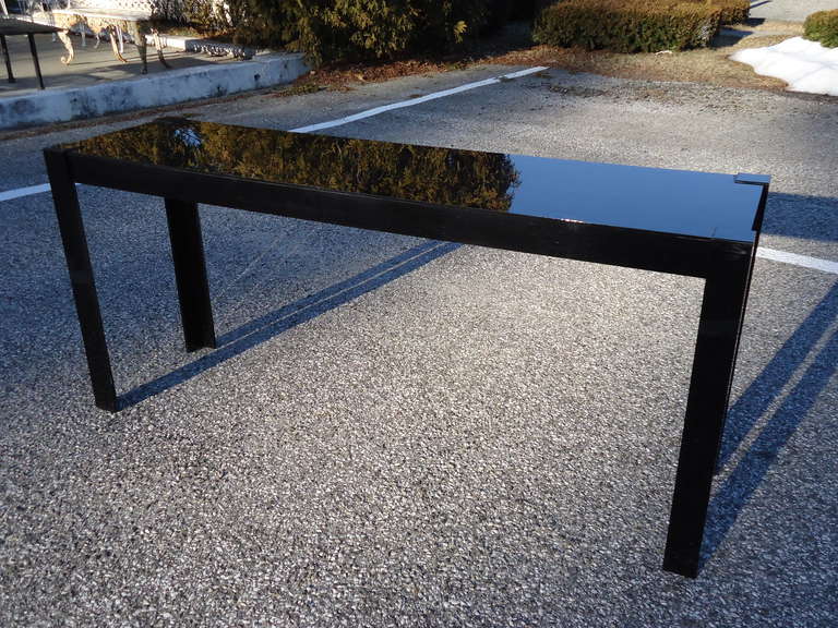 Great as a sofa table or console table. Also available is a large round Black Acrylic Mirror to match. As well as two Lucite black and white end tables/nightstands that light up.