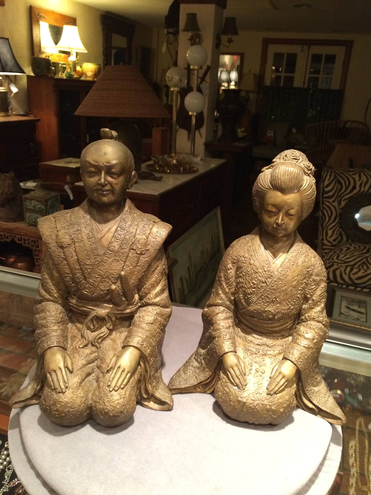 Pair of bronze Asian statues. Highly detailed and beautiful pair.