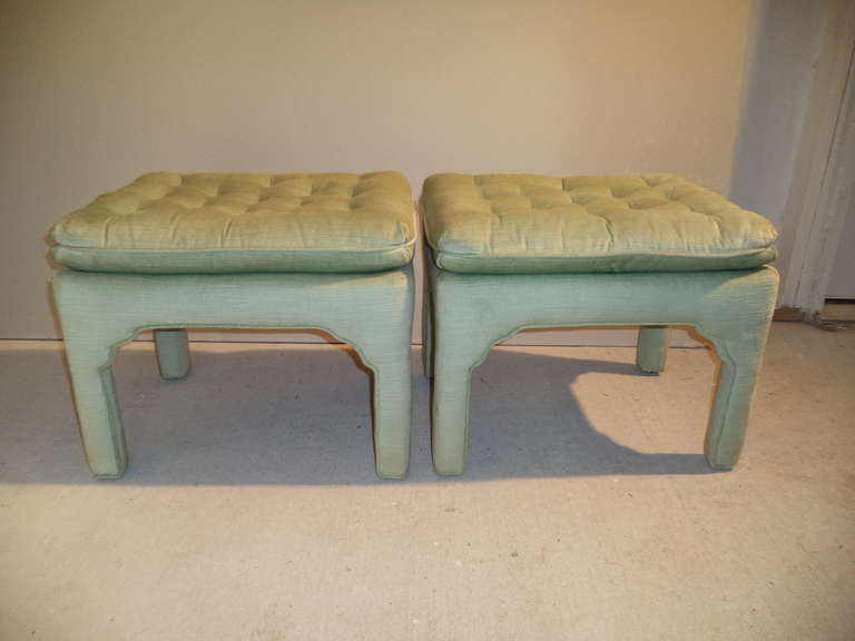 Pair of upholstered stools by Henredon. Excellent condition. Tufted button back detail. Great for under a Parsons table. No recovering necessary.
