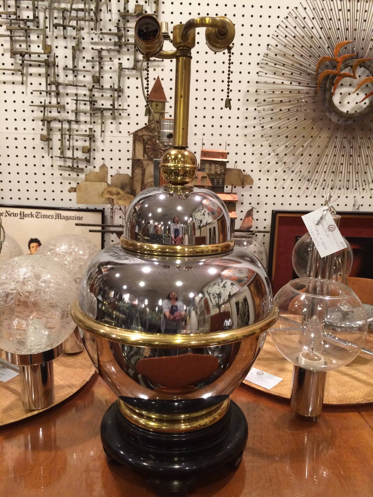 Hollywood Regency  Two-tone chrome and brass table lamp. Nice bulbous shape with resin base. Double light top.