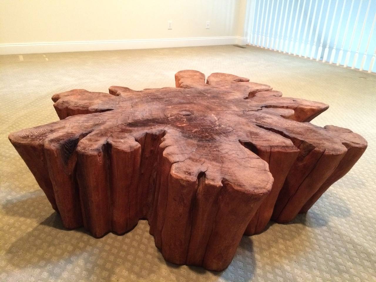 Redwood Slab Coffee Table. Amazing in color and organic in shape this coffee table would complement any decor. A true standout! The live edge top can be sanded and polished if you want a more of a finished look which is included in price.