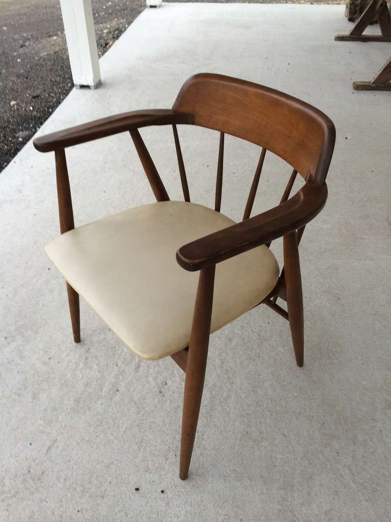 Viko Baumritter Arm Chair. Walnut with ivory vinyl seat cushion. Signed underneath with original tag as well.