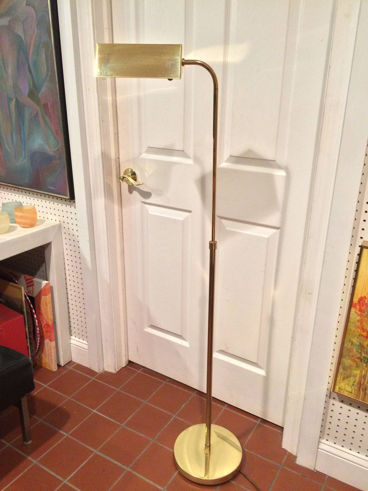 Mid Century Brass Floor Lamp. Adjustable and Swivels. Original tag Made by Alsy.