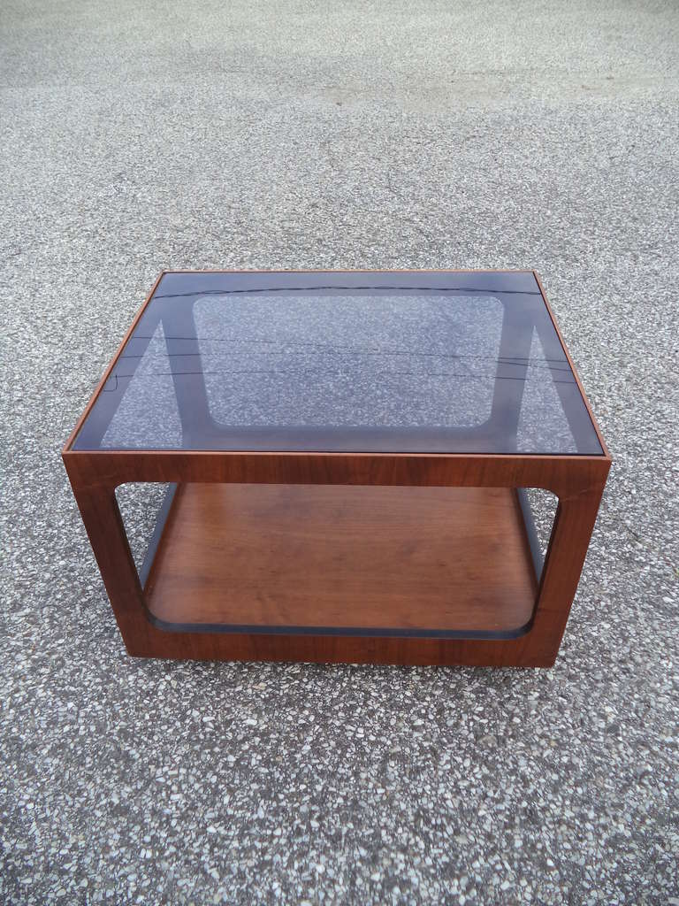 Mid Century Table with Smoked Glass Top and lower shelf.