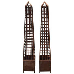 Pair of Monumental Iron Latticework Obelisks with Planters