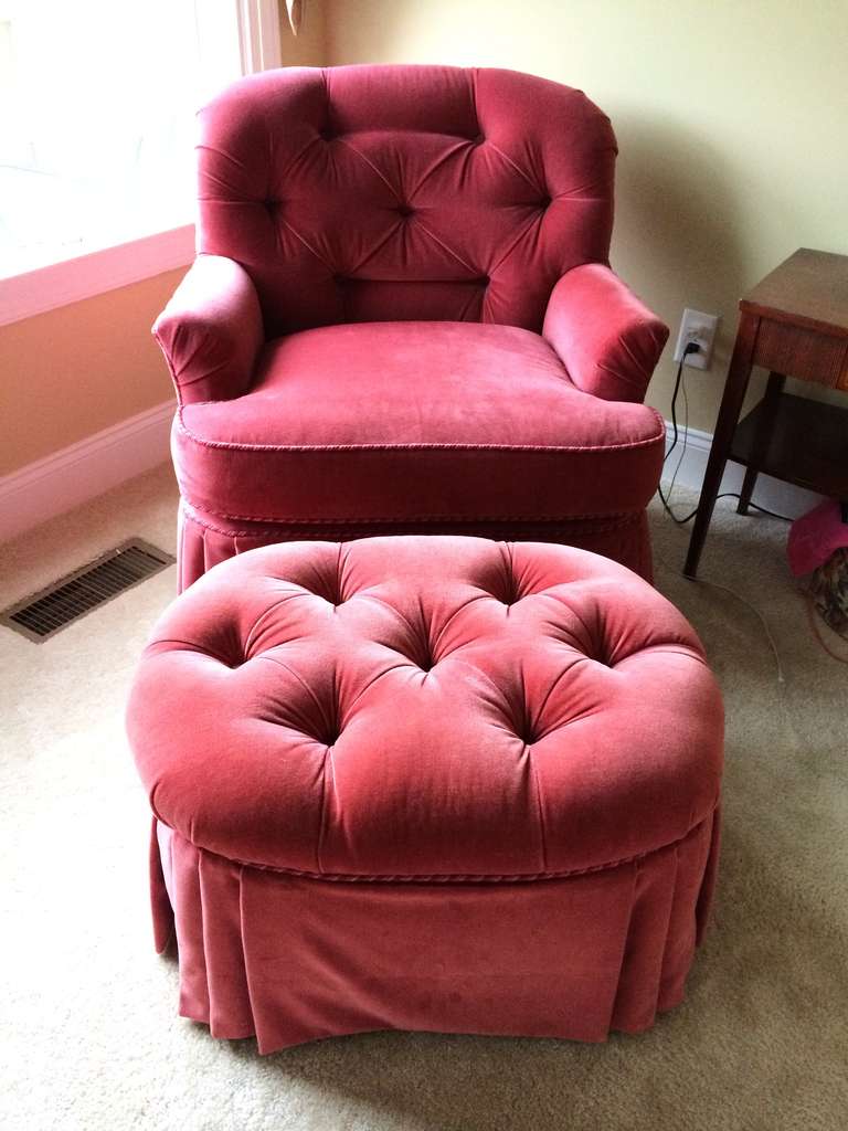 Hollywood Regency tufted lounge chair and ottoman. High quality Raspberry skirted Velvet upholstery with accented piping. The ultimate in luxury and comfort. Great for Bedroom or dressing room.Ottoman is 20.50