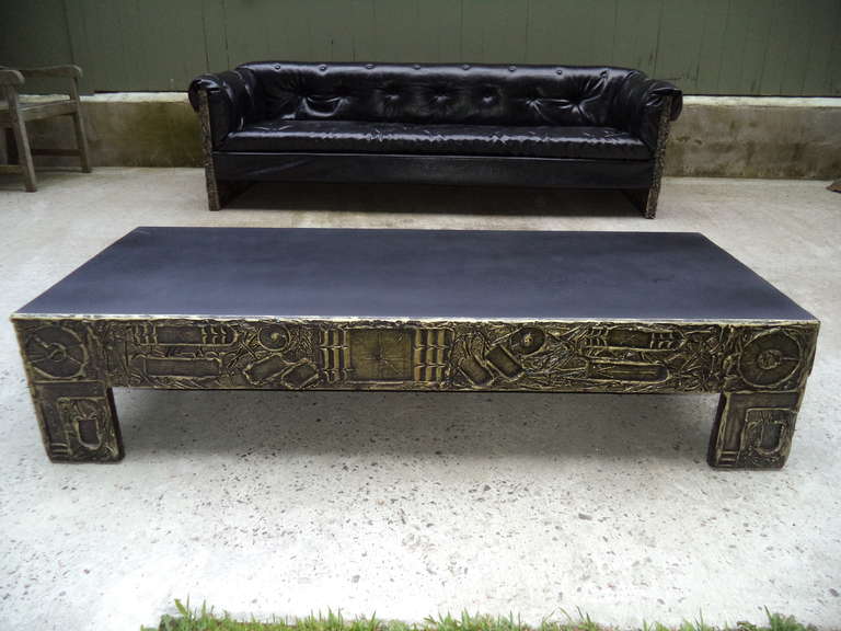 Adrian Pearsall for Craft Associates Brutalist Coffee Table in the manner of Paul Evans. Made of a sculpted bronze resin over wood. The table top is a black laminate reminiscent of the slate tops of the former designer.