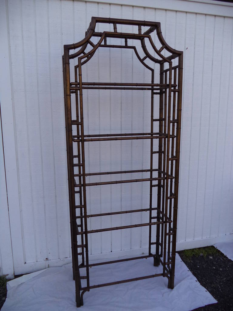 Pair of Chinese Chippendale Pagoda Style Faux Bamboo Etagere. Heavy hand forged Iron with a tortoiseshell style finish of dark golden brown with black . High quality , timeless style. One is slightly darker than the other so not an exact match in