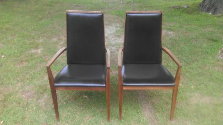 Pair of Mid Century Modern Armchairs by Dillingham.
Classic Solid Walnut with Black vinyl. Great for dining or for office.