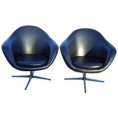 Pair of Retro Overman Swivel lounge chairs