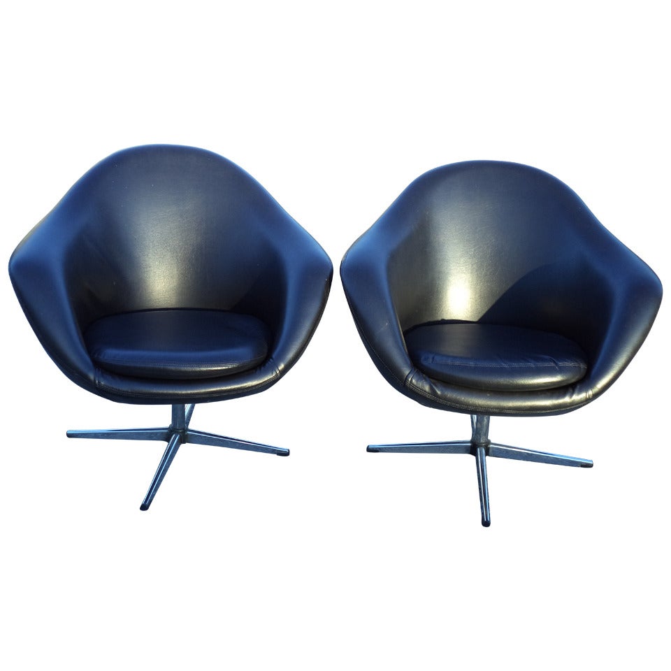 Pair of Vintage Overman Swivel lounge chairs